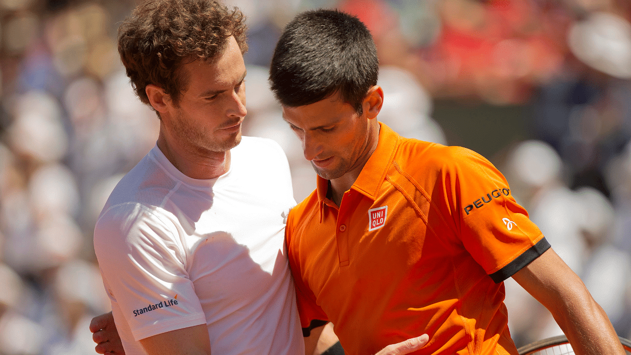 Novak Djokovic (SRB) (L) and Andy Murray (GBR) (R) at the net after their match on day 14 of the 2015 French Open