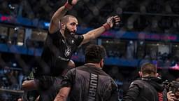 Belal Muhammad (red gloves) defeats Sean Brady (blue gloves) during UFC 280 at Etihad Arena.