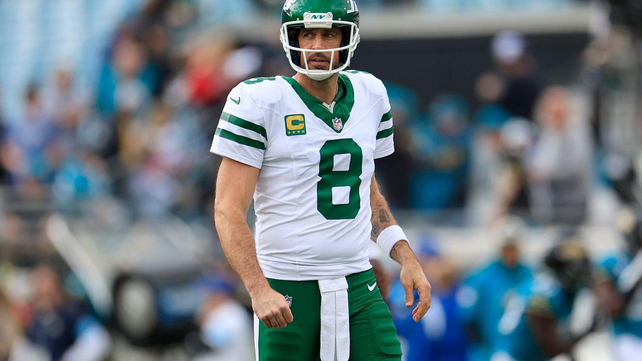 New York Jets quarterback Aaron Rodgers (8) looks on before an NFL football matchup Sunday, Dec. 15, 2024 at EverBank Stadium in Jacksonville.