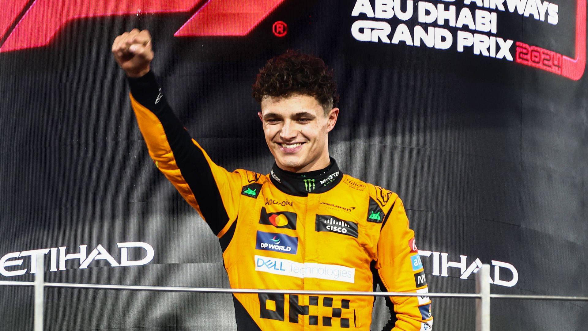 Lando Norris of McLaren celebrates on the podium during Formula 1 Abu Dhabi Grand Prix at Yas Marina Circuit on December 8th, 2024