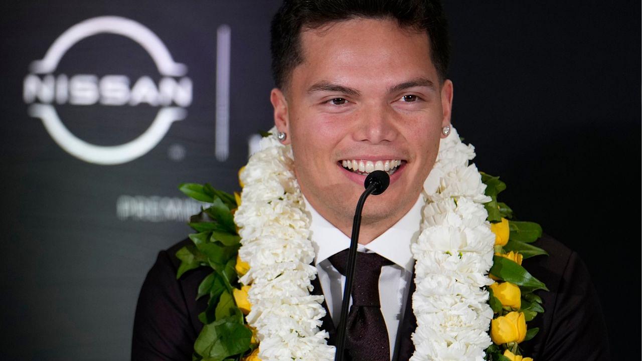 Oregon Ducks quarterback Dillon Gabriel speaks on stage during a press conference before the 2024 Heisman Trophy Presentation.