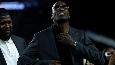 Chad Johnson has a commemorative jacket put on him after being announced as as being a Bengals Ring of Champions inductee at halftime of the NFL game between the Cincinnati Bengals and Los Angeles Rams at Paycor Stadium in Cincinnati.