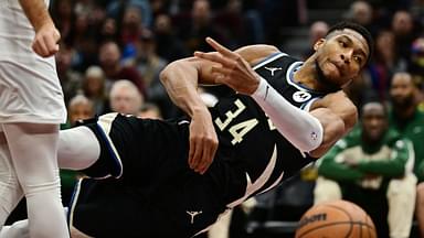 Milwaukee Bucks forward Giannis Antetokounmpo (34) tries to save the ball from going out of bounds during the first half against the Cleveland Cavaliers at Rocket Mortgage FieldHouse