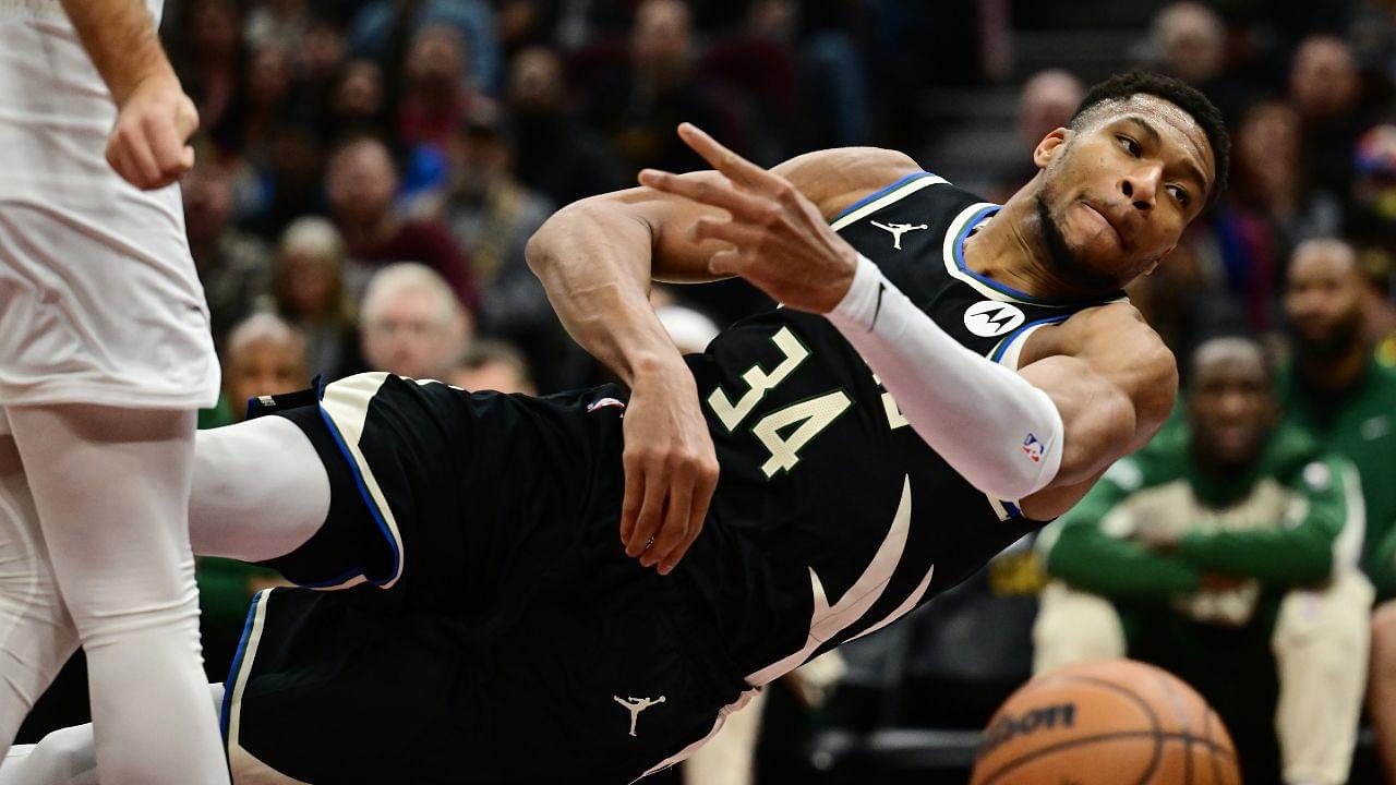 Milwaukee Bucks forward Giannis Antetokounmpo (34) tries to save the ball from going out of bounds during the first half against the Cleveland Cavaliers at Rocket Mortgage FieldHouse