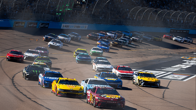 NASCAR Cup Series driver Martin Truex Jr leads Joey Logano (22) at the green flag to start the NASCAR Cup Series Championship race at Phoenix Raceway.