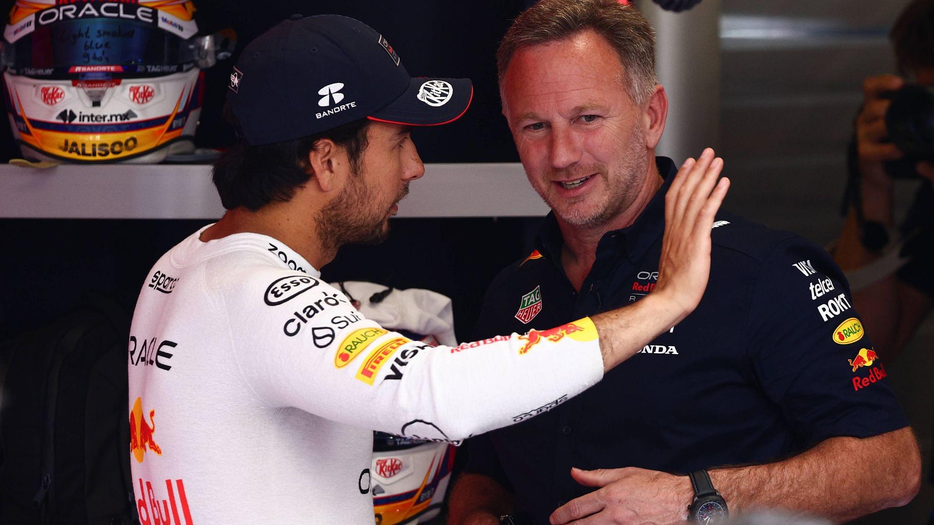 Sergio Perez of Red Bull Racing and Christian Horner before the Formula 1 Spanish Grand Prix at Circuit de Barcelona-Catalunya in Barcelona