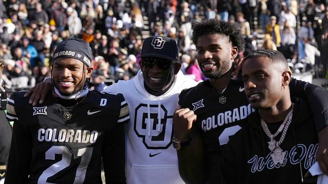 Boulder, Colorado, USA; Colorado Buffaloes safety Shilo Sanders (21) and head coach Deion Sanders and quarterback Shedeur Sanders (2) and social media producer Deion Sanders Jr. following the win against the Oklahoma State Cowboys at Folsom Field.