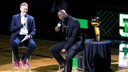 Basketball Hall of Fame and former Boston Celtic, Kevin Garnett speaks with Brian Scalabrine during the number retirement ceremony after the game between the Boston Celtics the Dallas Mavericks at TD Garden.