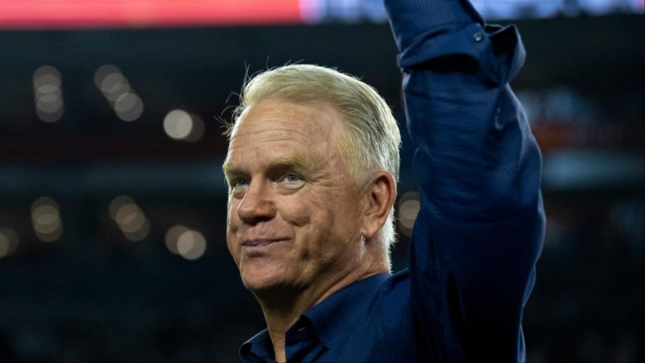 Boomer Esiason, former Cincinnati Bengals quarterback, waives before being announced at halftime as a Bengals Ring of Champions inductee at halftime of the NFL game between the Cincinnati Bengals and Los Angeles Rams at Paycor Stadium in Cincinnati on Monday, Sept. 25, 2023.