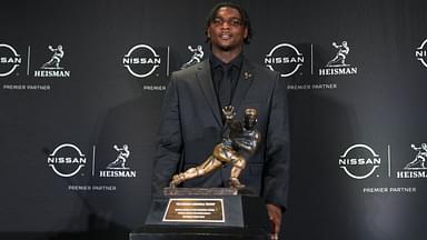 Miami Hurricanes quarterback Cam Ward poses for a photo during a press conference before the 2024 Heisman Trophy Presentation.