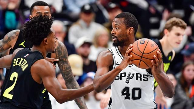 San Antonio Spurs forward Harrison Barnes (40) defends the ball against Utah Jazz guard Collin Sexton (2) during the first half at the Delta Center