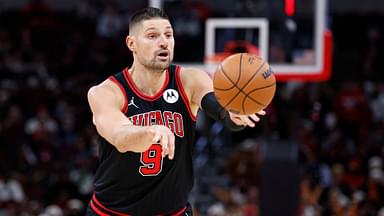 Chicago Bulls center Nikola Vucevic (9) passes the ball against the Indiana Pacers during the second half at United Center.