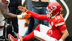 Cleveland Browns defensive tackle Dalvin Tomlinson (94) helps up Kansas City Chiefs quarterback Patrick Mahomes (15) after a tackle during the third quarter at Huntington Bank Field.