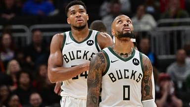 Milwaukee Bucks forward Giannis Antetokounmpo (34) and guard Damian Lillard (0) look on in the second quarter against the Chicago Bulls at Fiserv Forum.