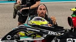 Lewis Hamilton of Great Britain and Mercedes reacts after performing donuts on track for his final race with Mercedes during the F1 Grand Prix of Abu Dhabi at Yas Marina Circuit