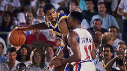 Los Angeles Lakers guard Magic Johnson (32) is defended by Detroit Pistons guard Isiah Thomas (11) at the Silverdome.