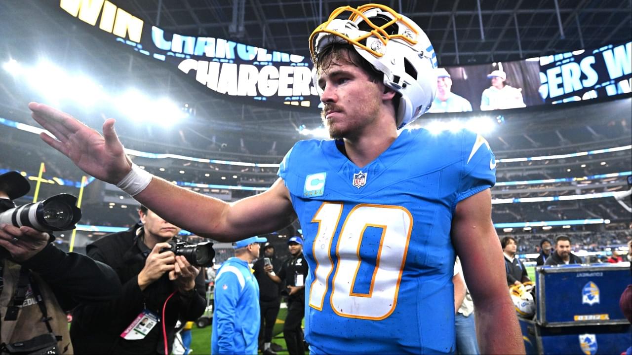 Los Angeles Chargers quarterback Justin Herbert (10) celebrates as he leaves the field after defeating the Denver Broncos at SoFi Stadium.