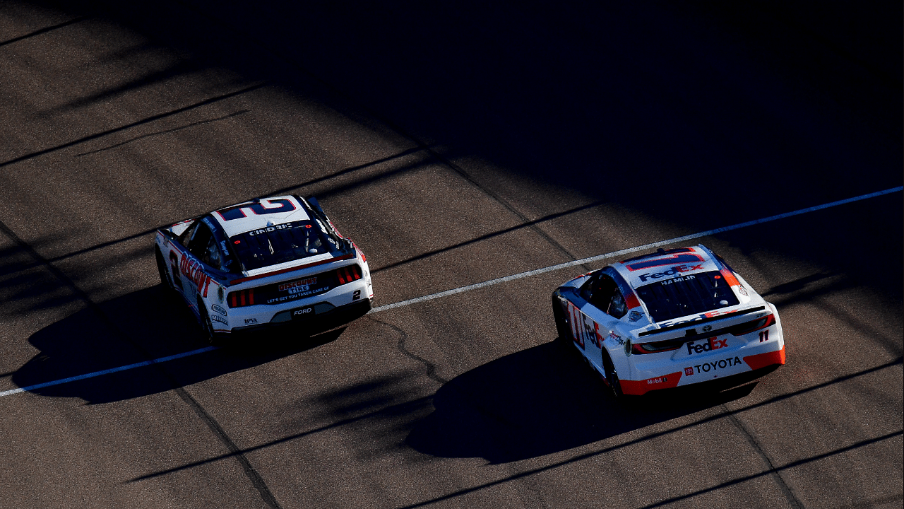 NASCAR Cup Series driver Austin Cindric (2) leads driver Denny Hamlin (11) during the Cup Series championship race at Phoenix Raceway.