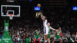 Philadelphia 76ers guard Tyrese Maxey (0) shoots for three points against the Boston Celtics during the second half at TD Garden