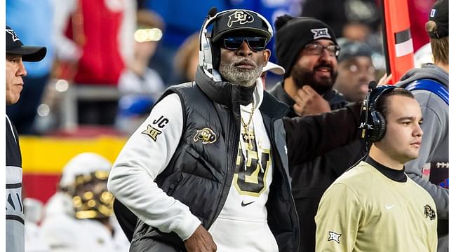 Colorado head coach Deion Sanders watches the run of play during the 3rd quarter between the Kansas Jayhawks and the Colorado Buffaloes at GEHA Field at Arrowhead Stadium.