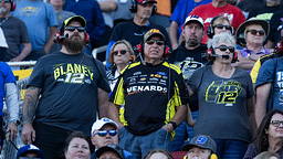 Fans in the crowd wear clothing apparel of NASCAR Cup Series driver Ryan Blaney (12) during the NASCAR Cup Series Championship race at Phoenix Raceway.