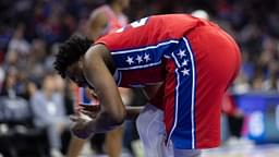 Philadelphia 76ers center Joel Embiid (21) grabs his face after a collision during the second quarter at Wells Fargo Center.