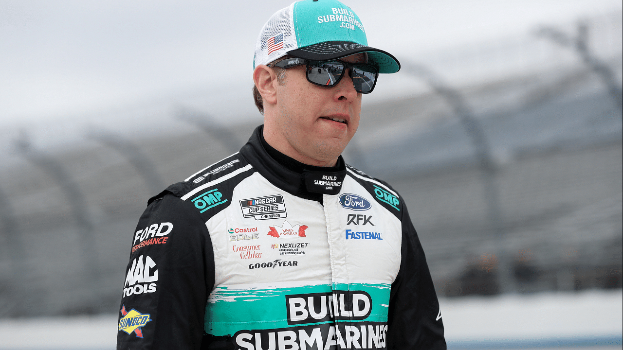 NASCAR Cup Series driver Brad Keselowski walks on pit road during practice and qualifying for the Wurth 400 at Dover Motor Speedway.