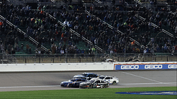 May 5, 2024; Kansas City, Kansas, USA; NASCAR Cup Series drivers Kyle Larson (5) and Chris Buescher (17) battle for the lead on the final lap off the Advent Health 400 at the Kansas Speedway. Mandatory Credit: Reese Strickland-Imagn Images