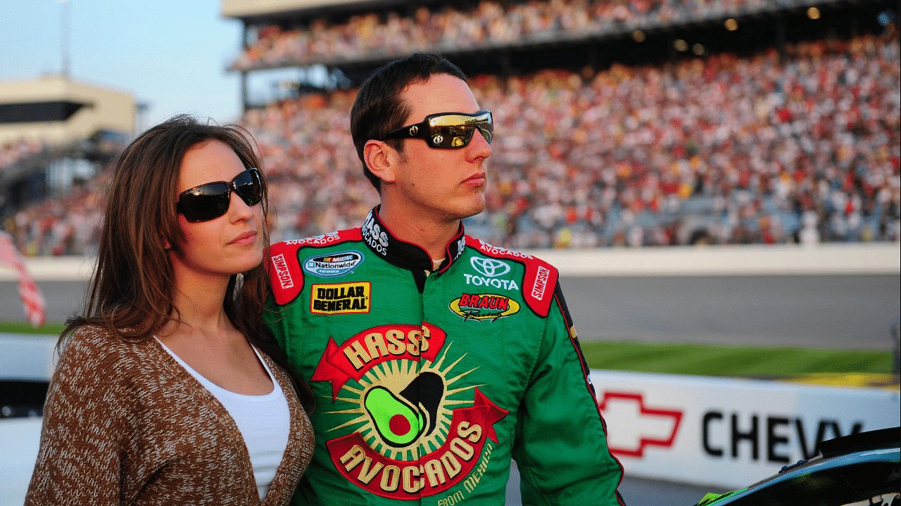 May 2, 2008; Richmond, VA, USA; NASCAR Nationwide Series driver Kyle Busch (right) with girlfriend Samantha Sarcinella during the Lipton Tea 250 at the Richmond International Raceway. Mandatory Credit: Mark J. Rebilas-Imagn Images