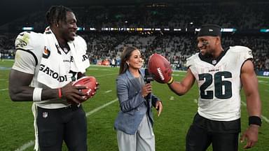 Sep 6, 2024; Sao Paulo, Brazil; Peacock sideline reporter Kaylee Hartung (center) interviews Philadelphia Eagles wide receiver A.J. Brown (11) and running back Saquon Barkley (26) after the 2024 NFL Sao Paolo Game at Neo Quimica Arena.