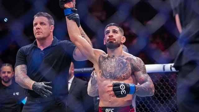 Ilia Topuria (blue gloves) wins a unanimous decision against Josh Emmett (red gloves) in a featherweight bout during UFC Fight Night at VyStar Veterans Memorial Arena.