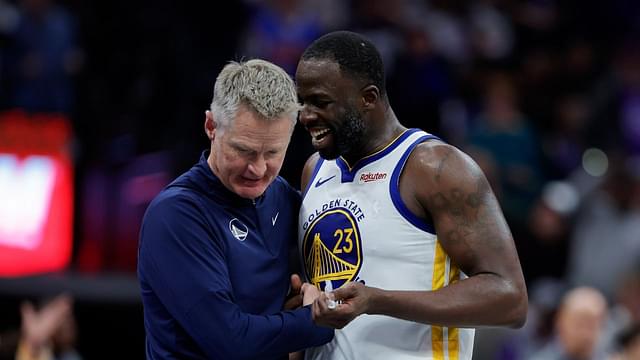 Golden State Warriors forward Draymond Green (23) talks with head coach Steve Kerr during the fourth quarter against the Sacramento Kings at Golden 1 Center.