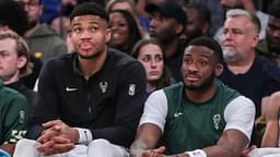 Milwaukee Bucks forward Giannis Antetokounmpo (l) and his brother Milwaukee Bucks forward Thanasis Antetokounmpo (r) watch the game from the bench in the fourth quarter against the New York Knicks at Madison Square Garden