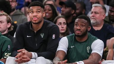 Milwaukee Bucks forward Giannis Antetokounmpo (l) and his brother Milwaukee Bucks forward Thanasis Antetokounmpo (r) watch the game from the bench in the fourth quarter against the New York Knicks at Madison Square Garden