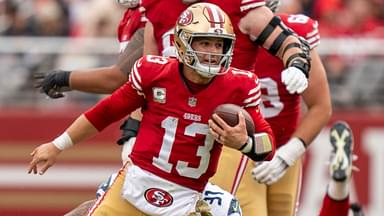 November 17, 2024; Santa Clara, California, USA; San Francisco 49ers quarterback Brock Purdy (13) runs the football against the Seattle Seahawks during the third quarter at Levi's Stadium.