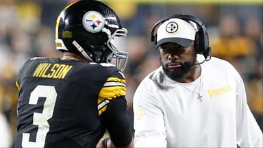 Pittsburgh Steelers head coach Mike Tomlin (right) congratulates quarterback Russell Wilson (3) on his touchdown pass against the New York Jets during the second quarter at Acrisure Stadium.