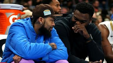 New Orleans Pelicans forward Zion Williamson (right) talks with forward Brandon Ingram (left) on the bench during the second half against the Memphis Grizzlies at FedExForum.