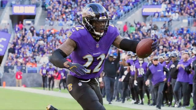 Baltimore Ravens running back Derrick Henry (22) scores a third quarter touchdown against the Denver Broncos at M&T Bank Stadium.