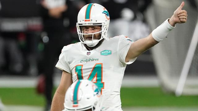 Dec 26, 2020; Paradise, Nevada, USA; Miami Dolphins quarterback Ryan Fitzpatrick (14) gestures in the fourth quarter against the Las Vegas Raidersat Allegiant Stadium. The Dolphins defeated the Raiders 26-25.