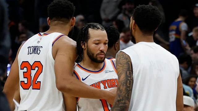 New York Knicks center Karl-Anthony Towns (32) hugs New York Knicks guard Jalen Brunson (11) after their game against the Washington Wizards at Capital One Arena.