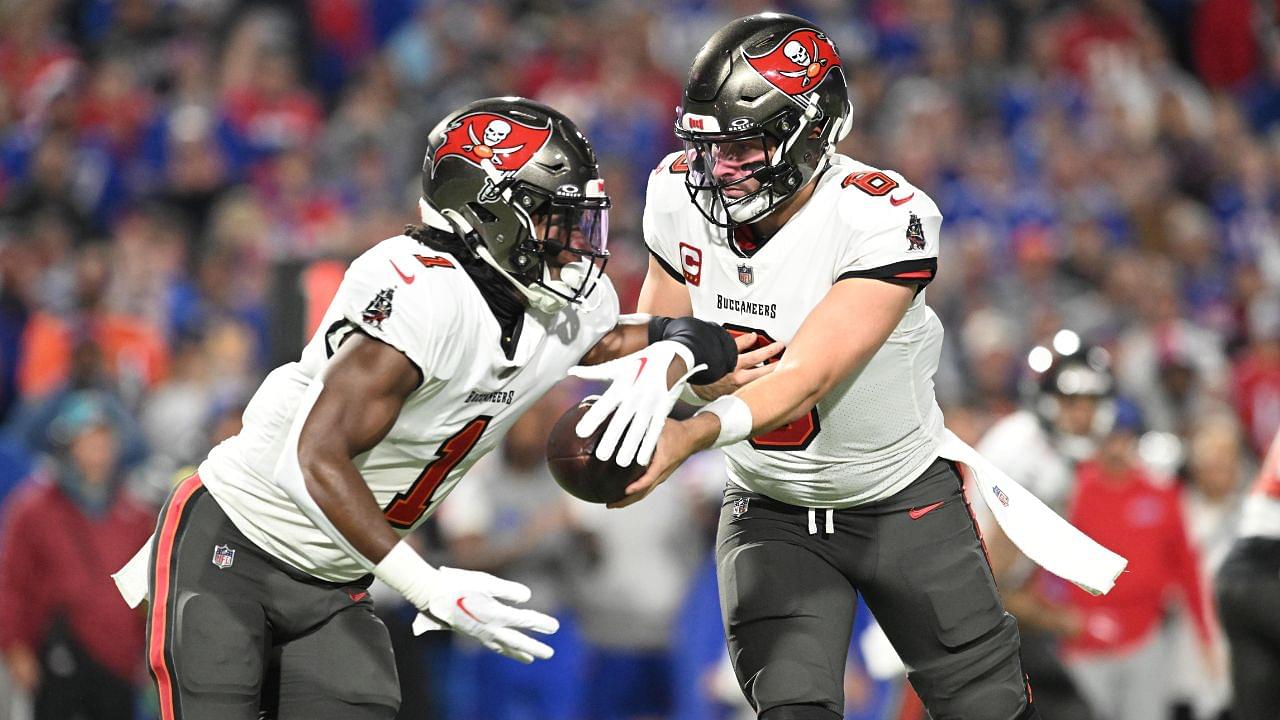 ampa Bay Buccaneers quarterback Baker Mayfield (6) hands the ball to running back Rachaad White (1) in the first quarter against the Buffalo Bills at Highmark Stadium.