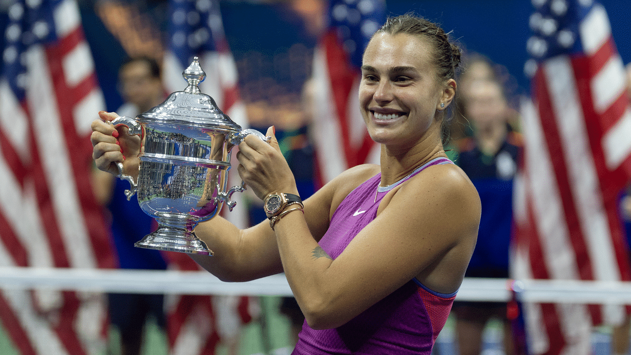 Aryna Sabalenka celebrates with the US Open trophy