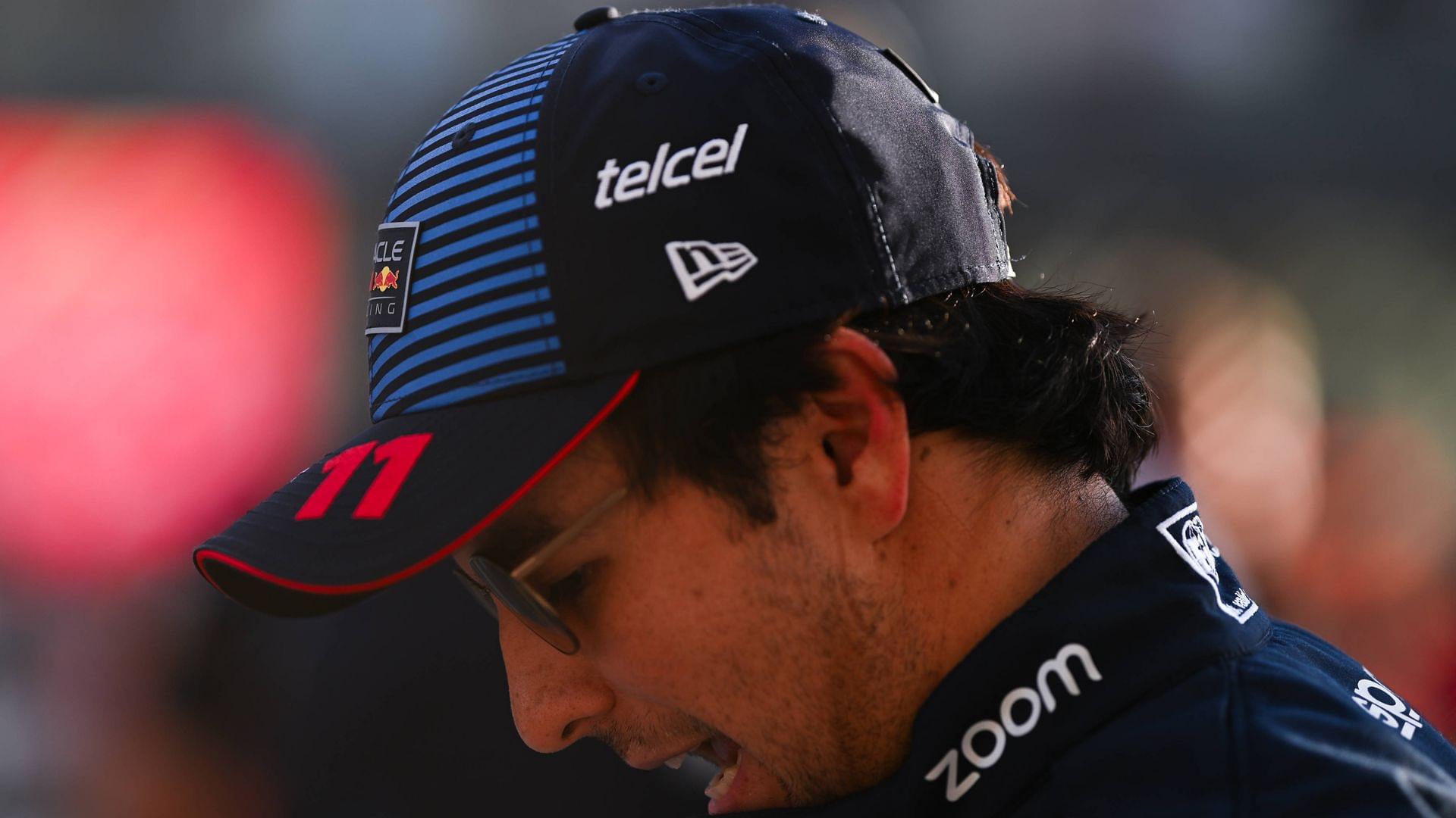 December 8, 2024, Mezzolombardo, Mezzolombardo, United Arab Emirates: Mexican driver Sergio Perez ( Oracle Red Bull Racing) is seen on the Grid before the National Anthem during the FIA Formula 1 Abu Dhabi Grand Prix at Yas Marina Circuit in Abu Dhabi, United Arab Emirates