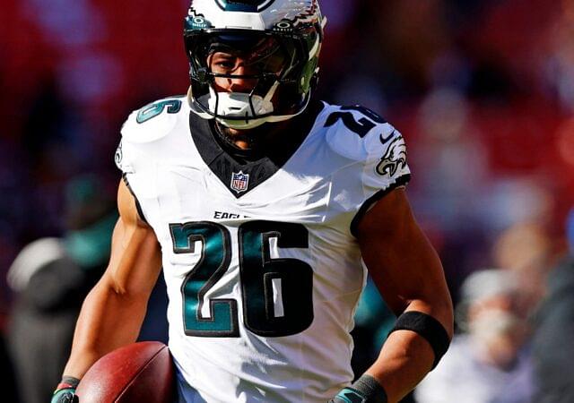 Philadelphia Eagles running back Saquon Barkley (26) warms up before playing against the Washington Commanders at Northwest Stadium.