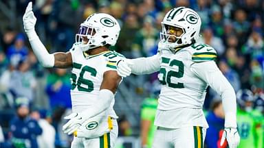 Dec 15, 2024; Seattle, Washington, USA; Green Bay Packers linebacker Edgerrin Cooper (56) celebrates with defensive end Rashan Gary (52) following a sack against the Seattle Seahawks during the first quarter at Lumen Field.