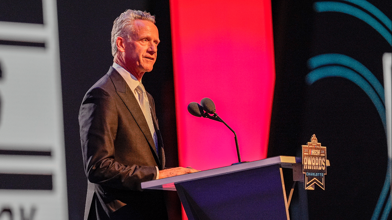 Nov 22, 2024; Charlotte, NC, USA; NASCAR President Steve Phelps speaks during the NASCAR Awards Banquet at Charlotte Convention Center.