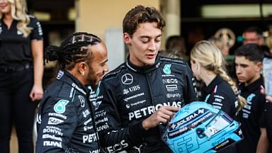 Lewis Hamilton of the Mercedes AMG F1 Team W15 and George Russell of the Mercedes AMG F1 Team W15 pose for portraits during the F1 Grand Prix of Abu Dhabi