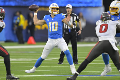 Dec 15, 2024; Inglewood, California, USA; Los Angeles Chargers quarterback Justin Herbert (10) throws a pass in the second half against the Tampa Bay Buccaneers at SoFi Stadium.