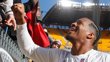 Cleveland Browns quarterback Jameis Winston (5) greets fans after warm-ups against the Pittsburgh Steelers at Acrisure Stadium.