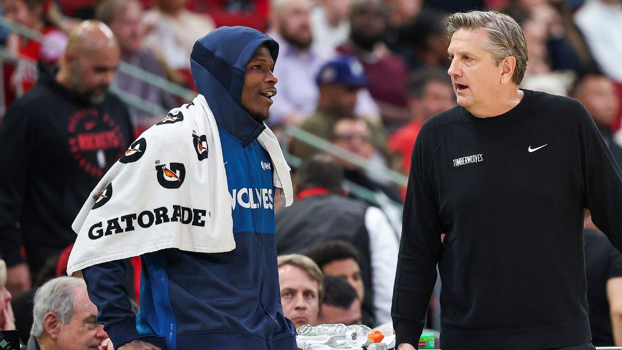 Minnesota Timberwolves head coach Chris Finch talks with guard Anthony Edwards (5) during the fourth quarter against the Houston Rockets at Toyota Center.